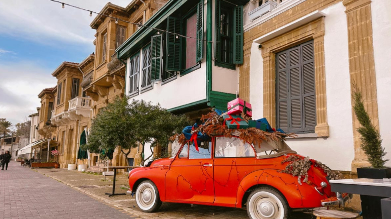 Classic red car on a street in Nicosia (Lefkosa), North Cyprus